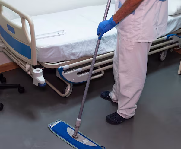 conceptual-photo-hospital-worker-cleaning-patient-room_337384-136